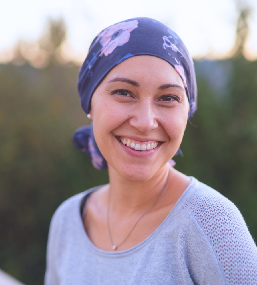 woman smiling with bandana