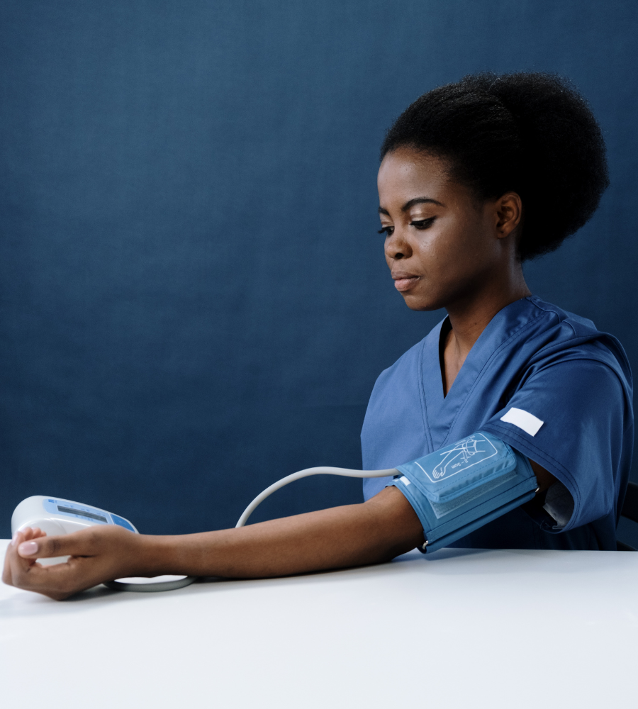 woman getting her hypertension measured