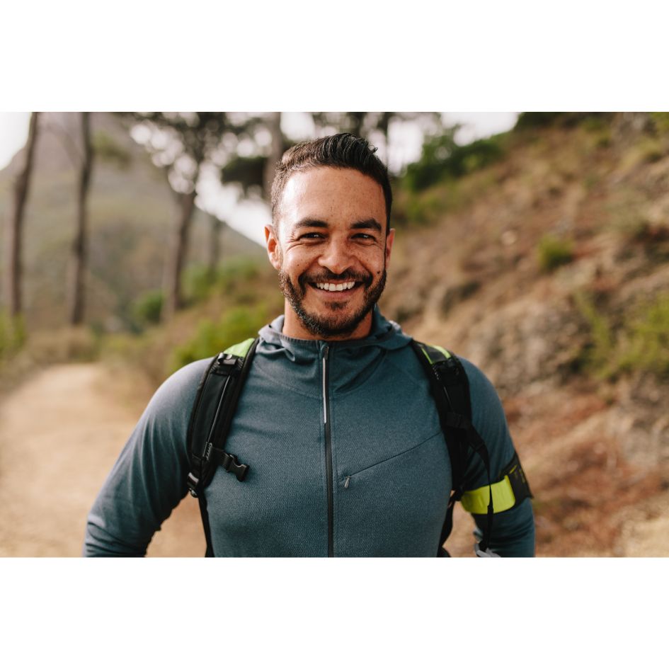 man with backpack, smiling